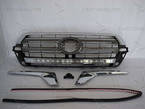 Решетка радиаторас ходовыми огнями на Toyota Land Cruiser 200